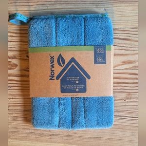 The Norwex Bathroom Scrub Mitt  2-in-1 mitt in Blue
